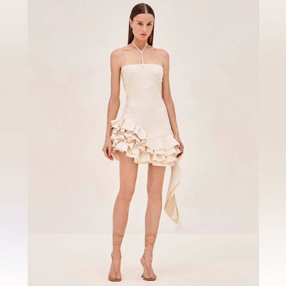 Alexis Cream colored mini dress with halter neckline in size Small